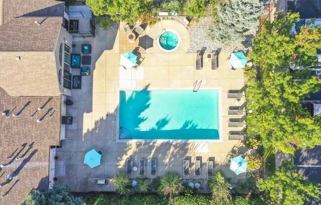 a birds eye view of the pool at the resort at longboat key club