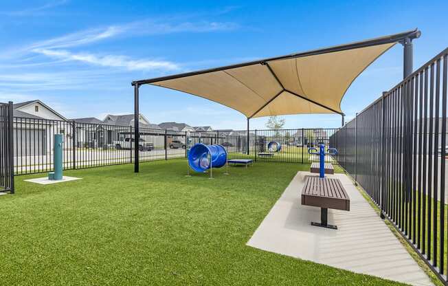 Dog park and agility equipment for your furry friends at Avilla Oakridge in Forney, TX.