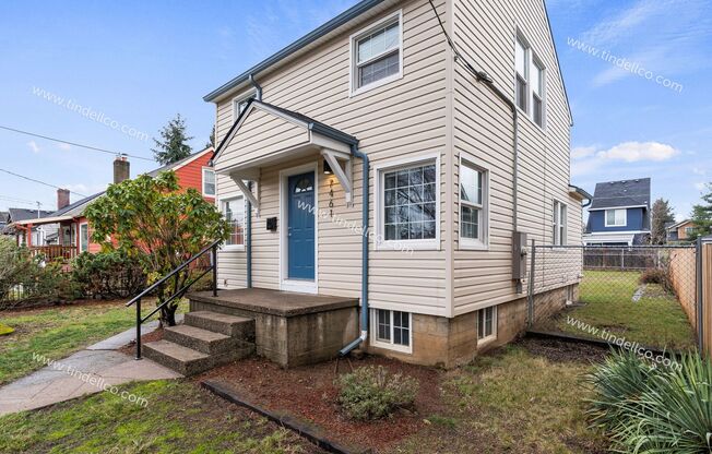 Updated 3 bedroom, 3 Level Home near New Seasons Market. 2 Car Garage & Landscape Included!
