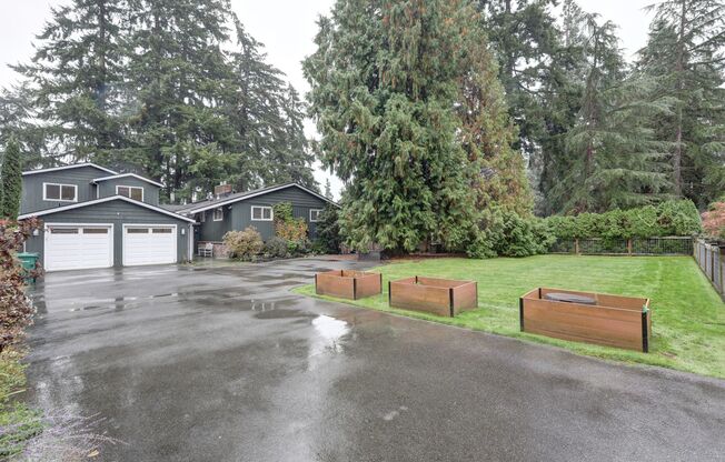 Mercer Island: 5-Bed, 4-Bath Home with Water Views, Large Yard, Updated Kitchen, Private Primary Suite