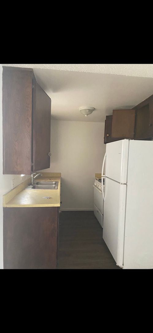 3 beds, 1.5 baths, 1,106 sqft, $1,400, Unit 203