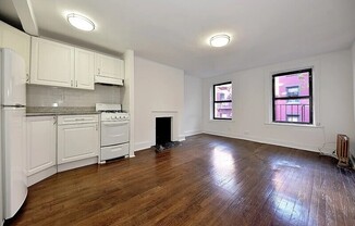 58 W 8 ST