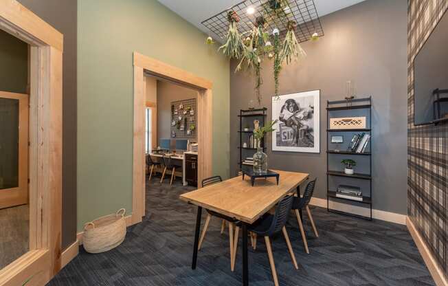 a room with a table and chairs at The Bend Arbordale, Virginia