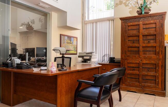 a dining room table in front of a window