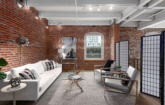 One Bedroom Historic Loft Style Condo In The Heart of The Pearl!