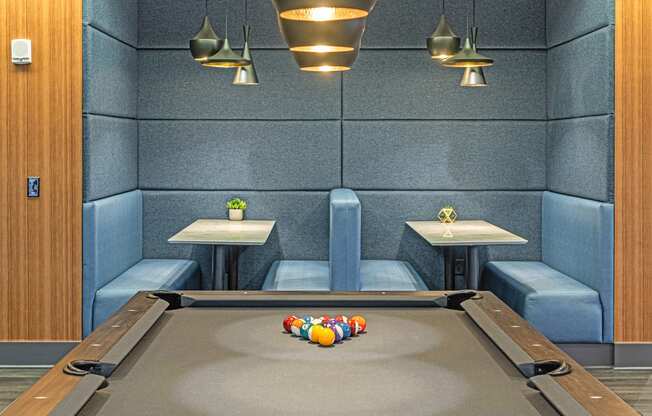a billiards table in a game room