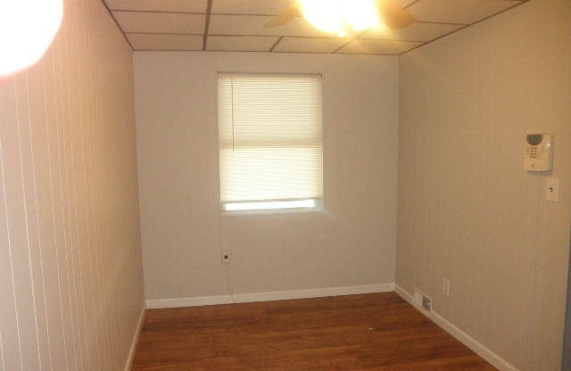 3 Bed, 1 Bath Townhouse with Fenced Yard, Hardwood Floors, and Fireplace