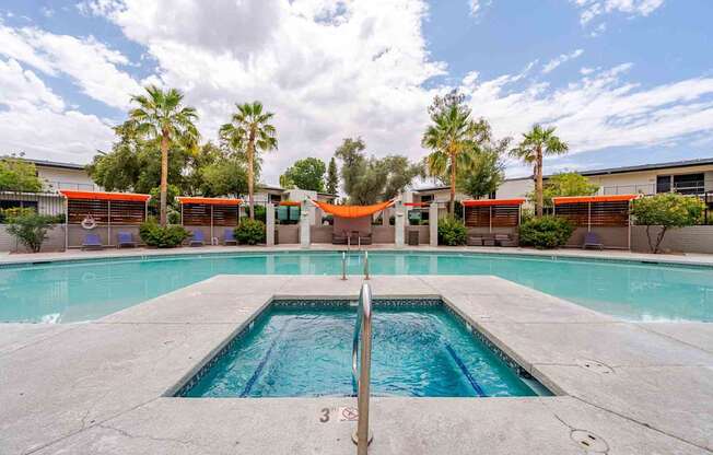 A swimming pool with a ladder in the middle of it.