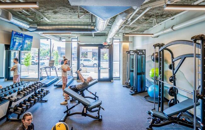 a group of people working out in a gym