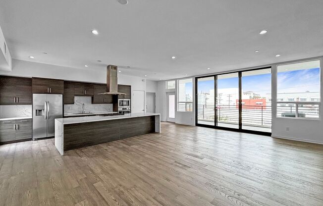 Modern 2BD/2BA Condo in North Park W/ High Ceilings, W/D & Reserved Garage Parking!