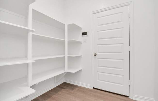 a walk in closet in a 555 waverly unit