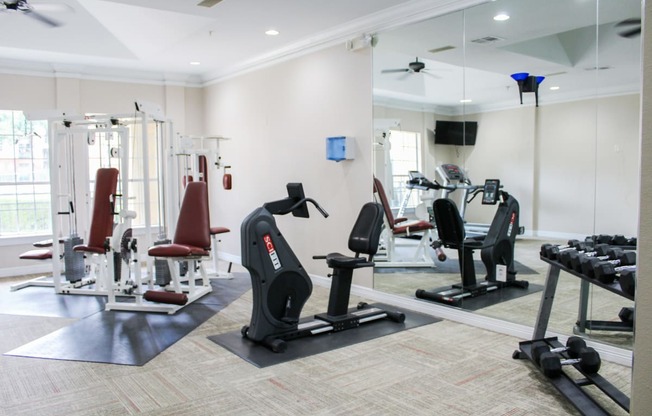Montfort Place fitness center. Two cable machines, one exercise bike. Montfort Place in North Dallas, TX, For Rent. Now leasing 1 and 2 bedroom apartments.