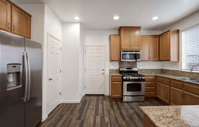 Stainless Steel Appliances - Three Bedroom Townhome