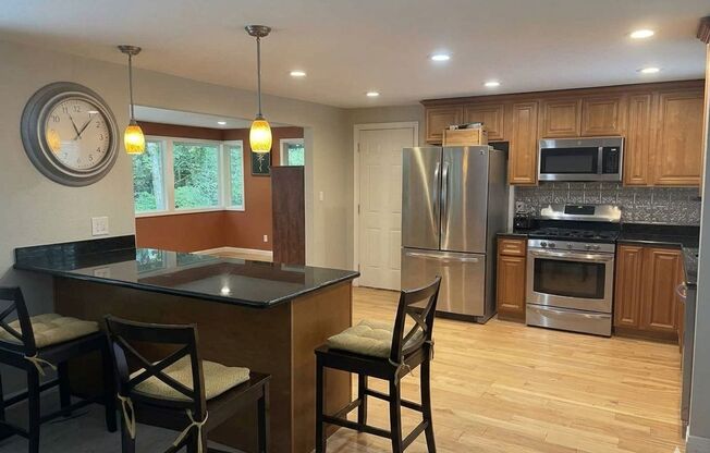 Beautifully Remodeled Issaquah Home with Modern Updates, Bonus Office & Outdoor Living Spaces!