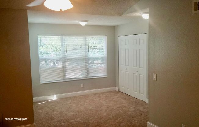 Spacious third floor unit located in the gated community of Venetian place