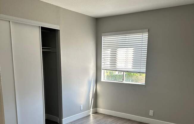 A stairwell with a window and a skylight.