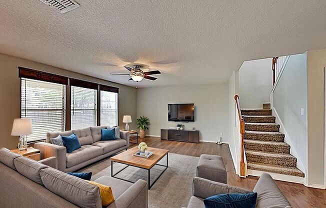 OPEN FLOOR PLAN  |  2 LIVING AREAS  |  4 BEDROOMS  |  2.5 BATHS