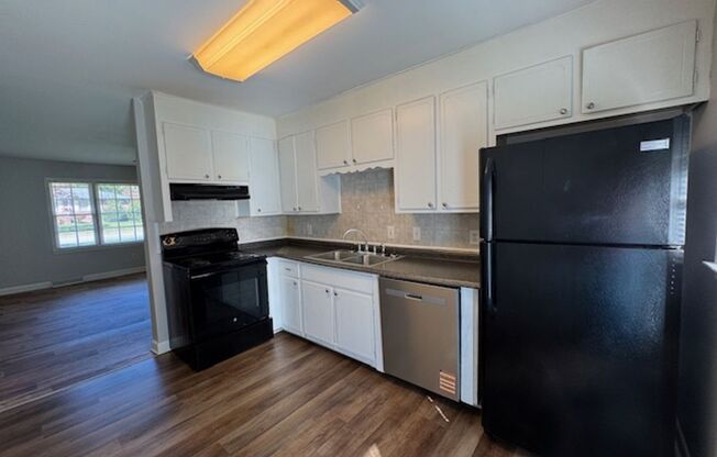 Location - Location - 2 bedrooms - 1.5 Baths, End Unit Townhome with Great Space in the heart of the Eastside.