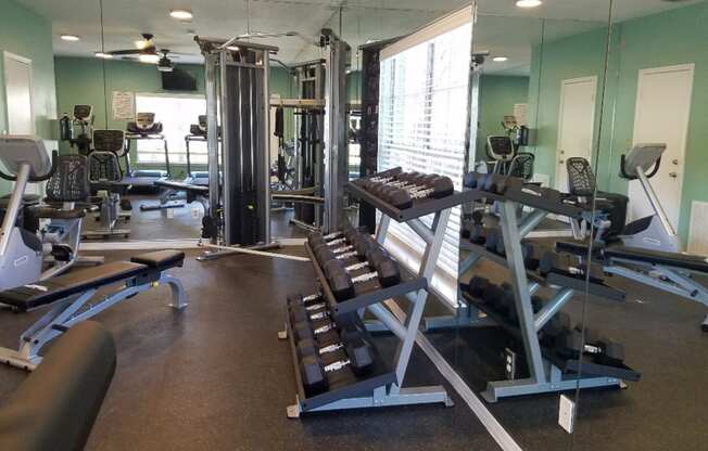 a gym with weights and other exercise equipment