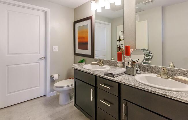 a kitchen with a sink and a mirror