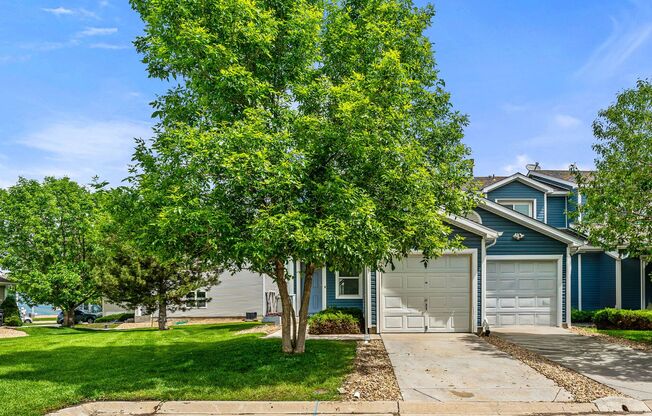 End-unit townhome in Cherry Creek School District with private yard