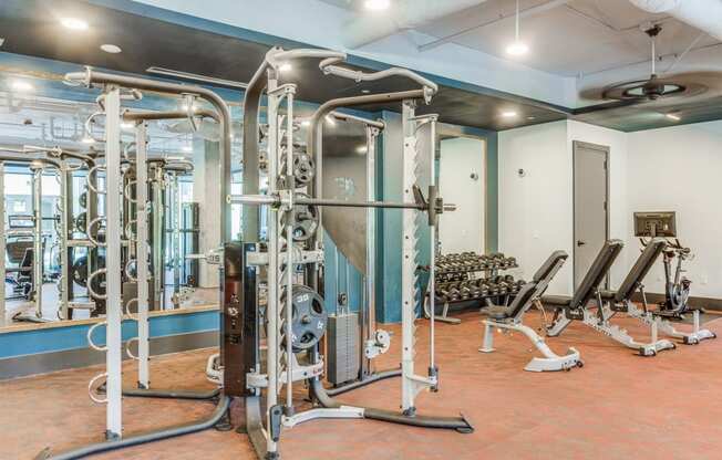 Fitness Center Interior with Exercise Machines at St. Elmo Apartment in Austin, TX