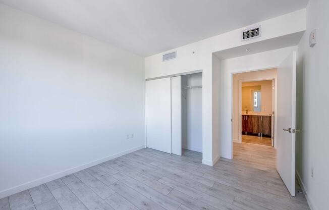 Countyline Apartments in Miami FL photo of  bedroom with hardwood flooring