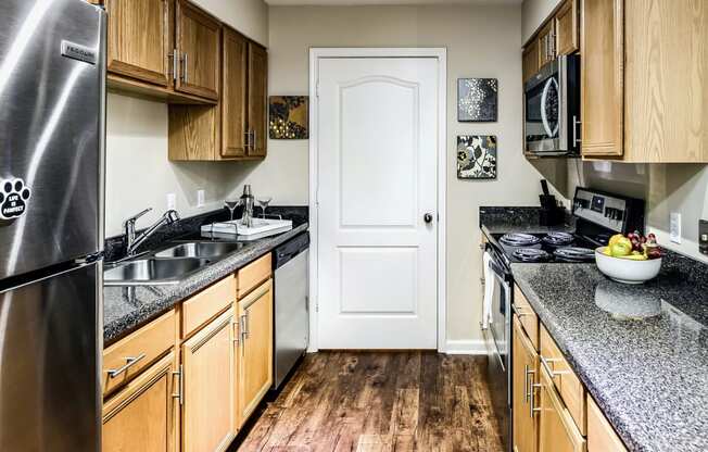 Large kitchens with stainless steel appliances at The Larimore, Omaha