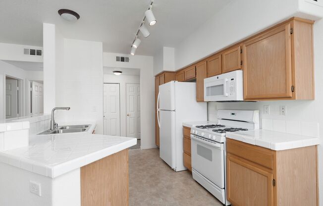 First floor unit in gated Silverado Ranch community with pool, spa and exercise room.