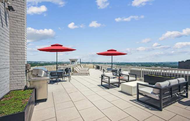 the rooftop terrace at the clarion hotel with umbrellas