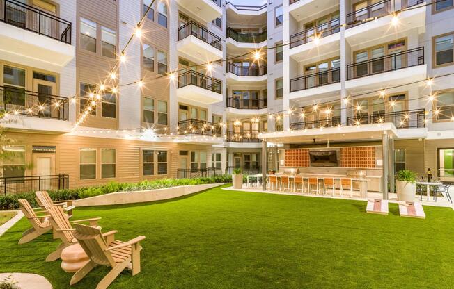 Experience serenity in our courtyard with vibrant greenspace and a fire pit ideal for gathering or quiet moments.