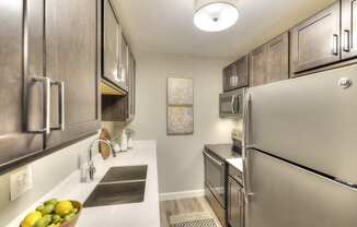 Kitchen Island With Pendent Lights, at Eagle Creek Apartments, Westmont Illinois