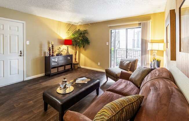 Living Room View at The Hollows Apartments in San Antonio, TX