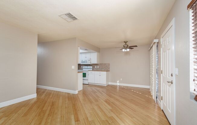 Two bedrooms on the second floor of henderson townhome with garage, granite counters and wood floors