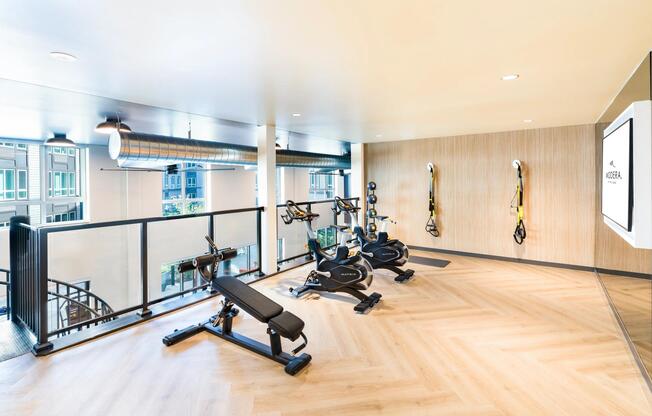 Recharge in Modera Beaverton’s light-filled fitness studio, designed for focused workouts.