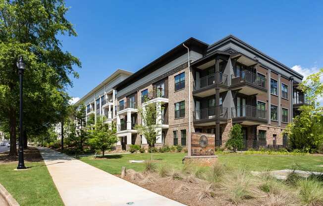 Modern Exteriors Give a Wonderful First Impression of Echo at North Pointe Center. Enjoy our Endless Amenities and Superb Location at Echo at North Pointe Center Apartment Homes, Alpharetta, GA 30009