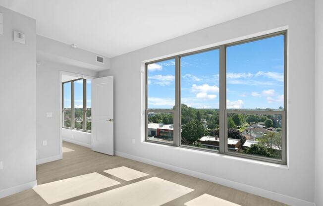 the view from the top of the stairs looking out a row of windows