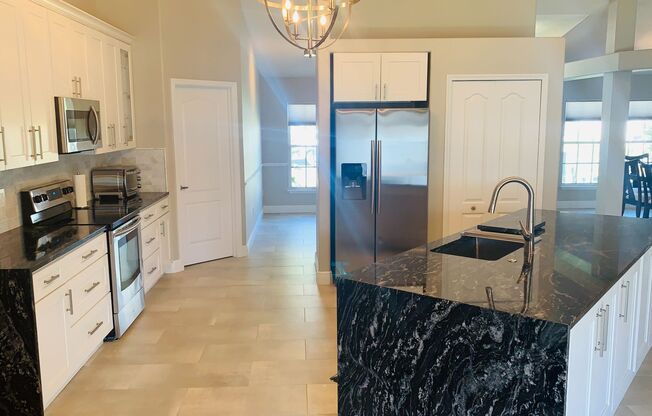 Lovely 4/2 in the Gated Lake Fisher Estates of Gotha!  Available Now!