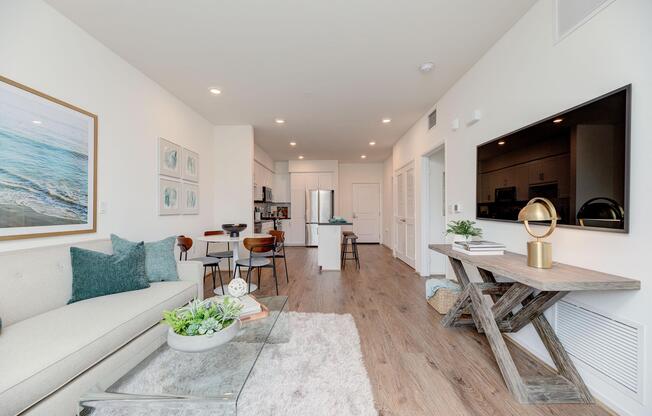 a living room filled with furniture and a fireplace