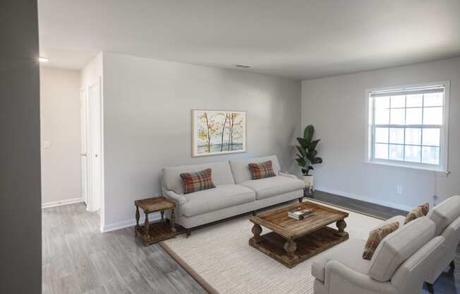 a living room with two couches and a coffee table at Venue at Carrollton, Georgia, 30117