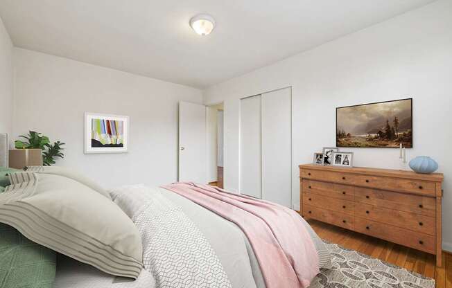 A bedroom with a bed, dresser, and painting on the wall.