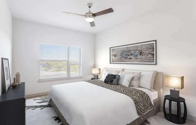 furnished bedroom with ceiling fan