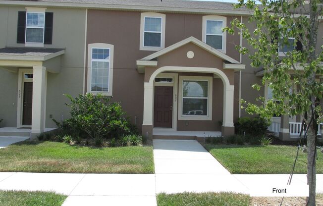 3 Bedroom 2.5 Bath 2 Car Garage 2 Story Townhome  in gated community at 607 Tiger Bay Ct, Groveland, FL 34736.