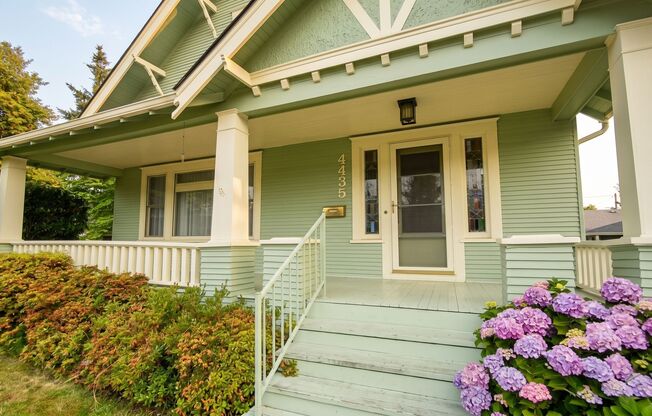 **Half Off the First Full Month of Rent!** Gorgeous Craftsman-Style 5 Bedroom Home Located in the Sought After Roseway Neighborhood!