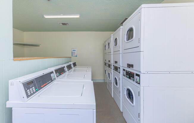 a kitchen with a stove top oven sitting inside of a refrigerator