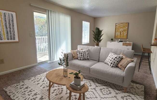 a living room with a couch and a coffee table