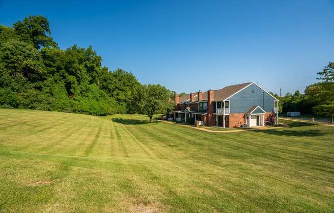 Lush Grass Area Behind Willowbend Apartment Homes