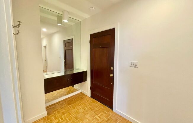 Coveted Pacific Heights Condo w/Private Patio, Garage Parking.  PROGRESSIVE