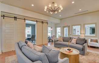 Lounge with chandelier in MacArthur Park clubhouse at MacArthur Park, Augusta, GA 30909