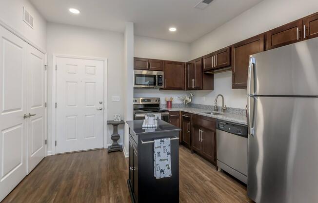 Modern Kitchen here at Riverstone Apartments At Long Shoals in Arden, NC 